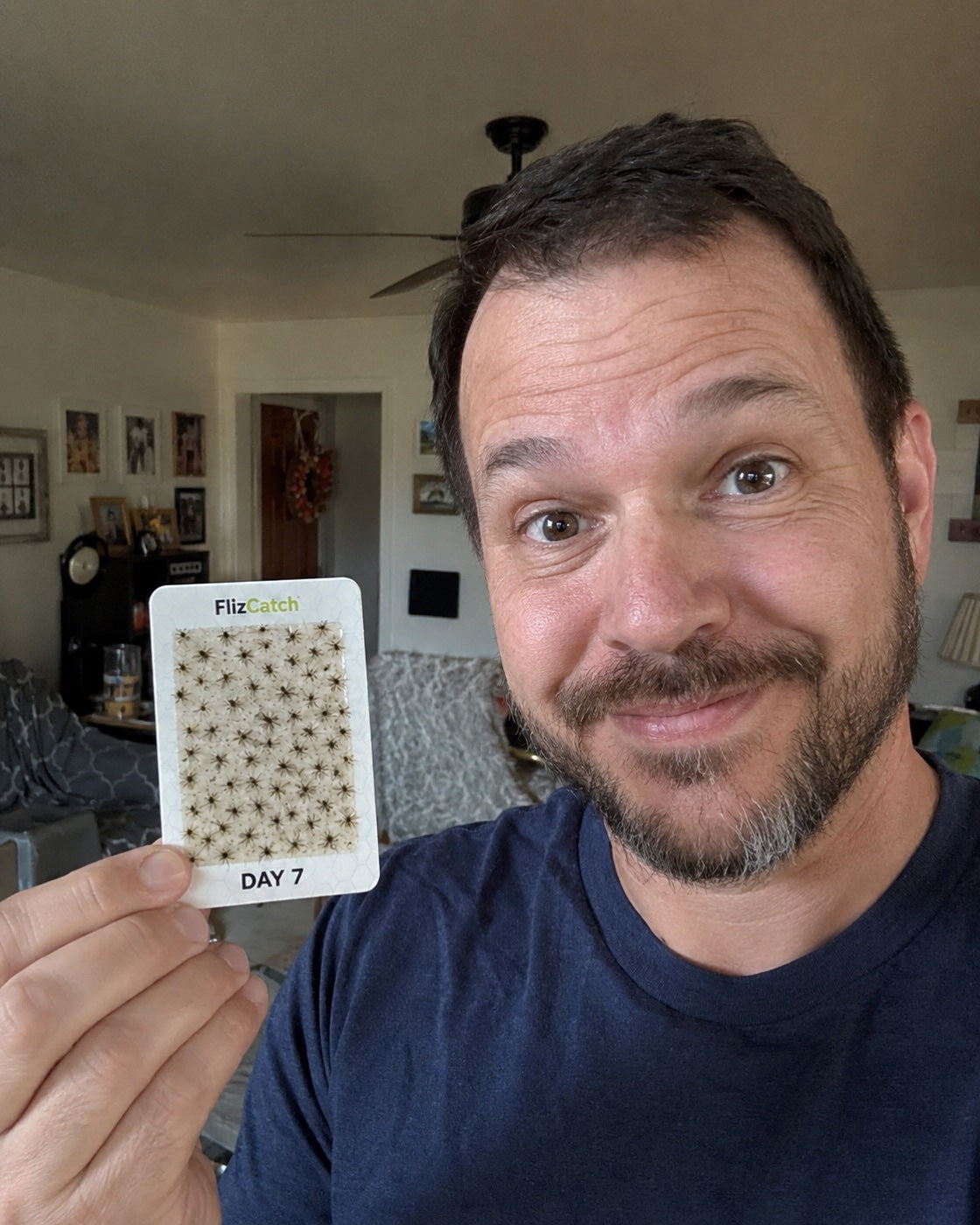 Verified customer showing a FlizCatch day seven glue card